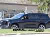 2025-cadillac-escalade-sport-black-raven-gba-prototype-spy-shots-undisguised-april-2024-exterior-002-side