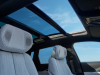 2024-cadillac-lyriq-luxury-450e-press-photos-interior-002-cabin-panoramic-sunroof-front-headrests