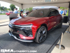 2024-chevrolet-blazer-ev-ss-radiant-red-metallic-gnt-first-real-world-photos-2022-woodward-dream-cruise-exterior-003-front-three-quarters