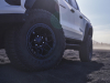 2024-chevrolet-colorado-zr2-bison-press-photos-exterior-025-35-inch-goodyear-wrangler-territory-mt-mud-terrain-tire-17-inch-black-aev-beadlock-wheel