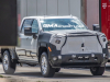2024-chevrolet-silverado-hd-high-country-prototype-spy-shots-exterior-010-front-end-grille-headlight