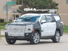 2024-chevrolet-tahoe-high-country-refresh-prototype-spy-shots-22-inch-sterling-silver-premium-painted-wheels-with-chrome-inserts-may-2023-exterior-004
