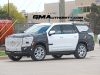 2024-chevrolet-tahoe-high-country-refresh-prototype-spy-shots-22-inch-sterling-silver-premium-painted-wheels-with-chrome-inserts-may-2023-exterior-005