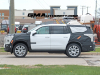 2024-chevrolet-tahoe-high-country-refresh-prototype-spy-shots-22-inch-sterling-silver-premium-painted-wheels-with-chrome-inserts-may-2023-exterior-007