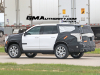 2024-chevrolet-tahoe-high-country-refresh-prototype-spy-shots-22-inch-sterling-silver-premium-painted-wheels-with-chrome-inserts-may-2023-exterior-008