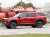 2024-chevrolet-traverse-z71-radiant-red-tintcoat-gnt-spy-shots-exterior-003-side-18-inch-wheels-pxw