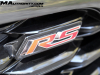2024-chevrolet-trax-2rs-mosaic-black-metallic-gb0-first-drive-exterior-032-rs-logo-badge-on-grille