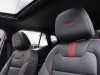 2024-chevrolet-trax-rs-press-photos-interior-007-front-seat-detail-rs-logo-on-headrests
