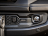 2024-gmc-sierra-2500-hd-aev-grande-concept-sema-2023-press-photos-exterior-026-aev-logo-badge-on-front-bumper-foglight