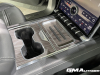 2024-gmc-sierra-ev-denali-edition-1-live-photos-interior-016-hvac-climate-controls-center-console-cup-holder-wireless-inductive-phone-charging-pad