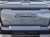 2024-gmc-sierra-ev-denali-edition-1-press-photos-exterior-003-front-fascia-grille-gmc-logo-badge-front-camera