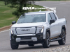 2024-sierra-ev-denali-edition-1-show-room-ready-on-the-road-photos-july-2023-exterior-001