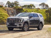 2025-gmc-yukon-denali-rhd-right-hand-drive-australia-and-nz-press-photos-exterior-002-side-front-three-quarters