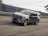 2025-gmc-yukon-denali-rhd-right-hand-drive-australia-and-nz-press-photos-exterior-004-front-three-quarters