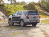 2025-gmc-yukon-denali-rhd-right-hand-drive-australia-and-nz-press-photos-exterior-005-side-rear-three-quarters-tail-lights