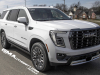 2025-gmc-yukon-denali-ultimate-white-frost-tricoat-g1w-prototype-spy-shots-undisguised-april-2024-exterior-002-front-three-quarters