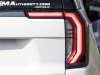 2025-gmc-yukon-denali-ultimate-white-frost-tricoat-g1w-prototype-spy-shots-undisguised-april-2024-exterior-006-tail-light-cluster