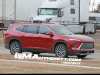 2025-buick-enclave-prototype-spy-shots-no-camouflage-red-february-2024-exterior-002-side-front-three-quarters