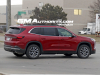 2025-buick-enclave-prototype-spy-shots-no-camouflage-red-february-2024-exterior-006-side-rear-three-quarters