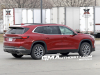 2025-buick-enclave-prototype-spy-shots-no-camouflage-red-february-2024-exterior-007-side-rear-three-quarters