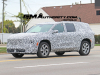 2025-buick-enclave-prototype-spy-shots-october-2023-exterior-003-side-front-three-quarters