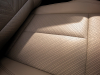 2025-cadillac-escalade-iq-sport-reveal-photos-interior-008-front-seat-stitching-detail