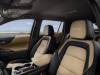 2025-chevrolet-equinox-activ-press-photos-interior-001-cabin-front-seats-activ-logo-badge-on-headrests-center-console-cup-holders