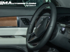 2026-cadillac-vistiq-prototype-spy-shots-february-2024-interior-008-steering-wheel-door-panel