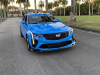 2022-cadillac-ct4-v-blackwing-gma-garage-electric-blue-exterior-002-front-three-quarters