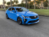 2022-cadillac-ct4-v-blackwing-gma-garage-electric-blue-exterior-003-front-three-quarters