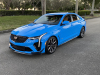 2022-cadillac-ct4-v-blackwing-gma-garage-electric-blue-exterior-014-front-three-quarters