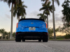 2022-cadillac-ct4-v-blackwing-gma-garage-electric-blue-exterior-022-rear-low-angle