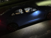 2022-cadillac-ct4-v-blackwing-gma-garage-electric-blue-exterior-027-side-puddle-light-cabin-lights-at-night