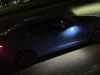 2022-cadillac-ct4-v-blackwing-gma-garage-electric-blue-exterior-028-side-puddle-light-at-night