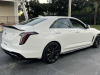 2022-cadillac-ct4-v-blackwing-summit-white-carbon-fiber-package-1-and-2-exterior-005-rear-three-quarters