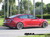 2022-cadillac-ct5-v-blackwing-infrared-tintcoat-gsk-gma-garage-exterior-028-side-rear-three-quarters