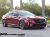 2022-cadillac-ct5-v-blackwing-infrared-tintcoat-gsk-gma-garage-exterior-055-side-front-three-quarters