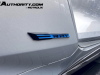 2024-chevrolet-corvette-e-ray-convertible-2023-amelia-concours-live-photos-exterior-005-e-ray-logo-badge-on-side