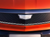 2025-cadillac-optiq-sport-china-press-photos-exterior-008-cadillac-logo-badge-on-led-front-fascia-grille