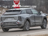 2025-cadillac-optiq-sport-gray-chinese-market-model-first-on-the-road-photos-december-2023-exterior-006-rear-three-quarters