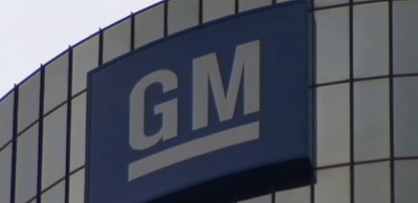 Image of the GM HQ logo, as GM stock value reaches a 12-month low.