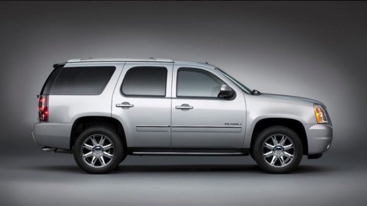 GMC Yukon Denali passenger side profile.