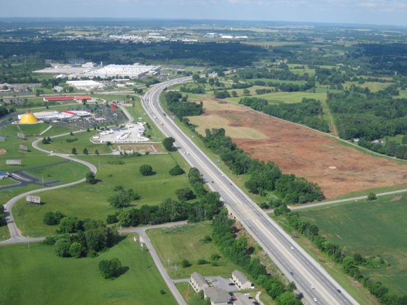 Looking north on I-65: Corvette Museum on left, Motorsports Park on right, Corvette Plant in background. 