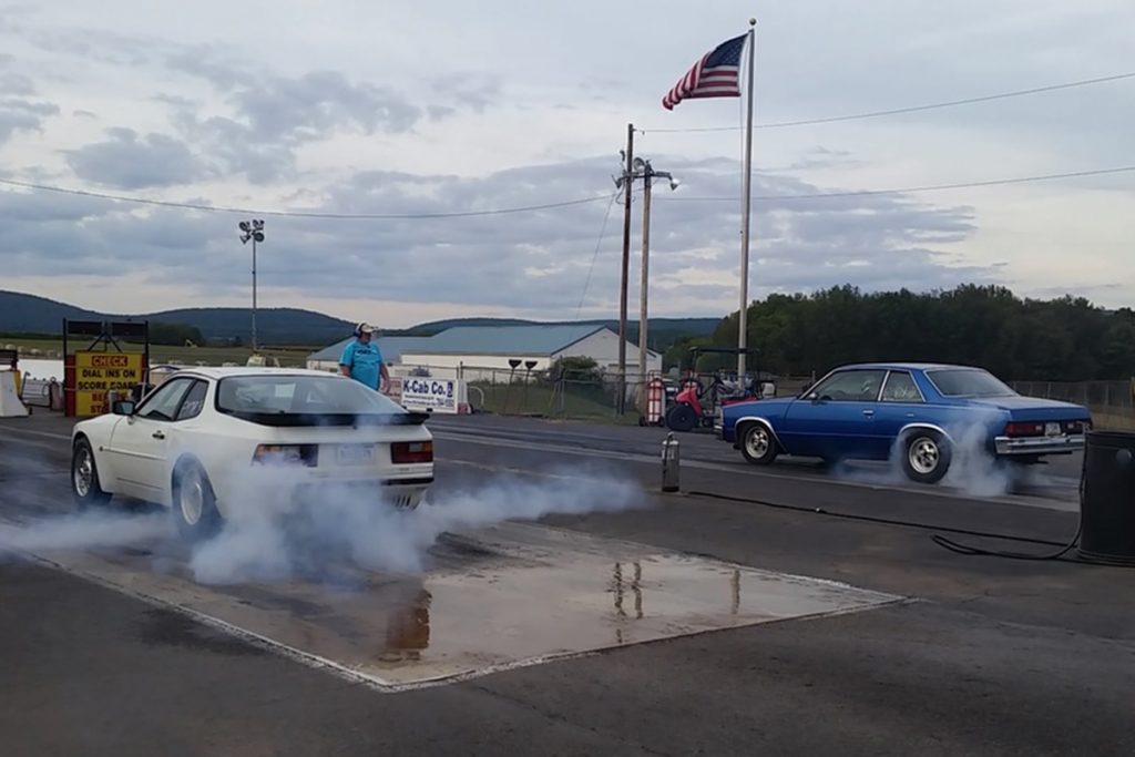 Craig and his rival perform burnouts to heat the tires.