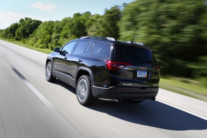 Rear three quarters view of the GMC Acadia. 