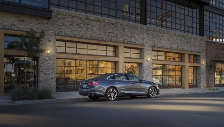Side rear three quarters view of the 2025 Chevy Malibu. 