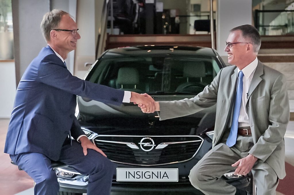 Opel CEO Shakes Hands with PSA CEO