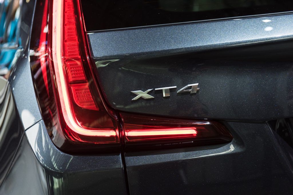 2019 Cadillac XT4 Premium Luxury exterior - 2018 New York Auto Show live 011 - taillight and XT4 badge