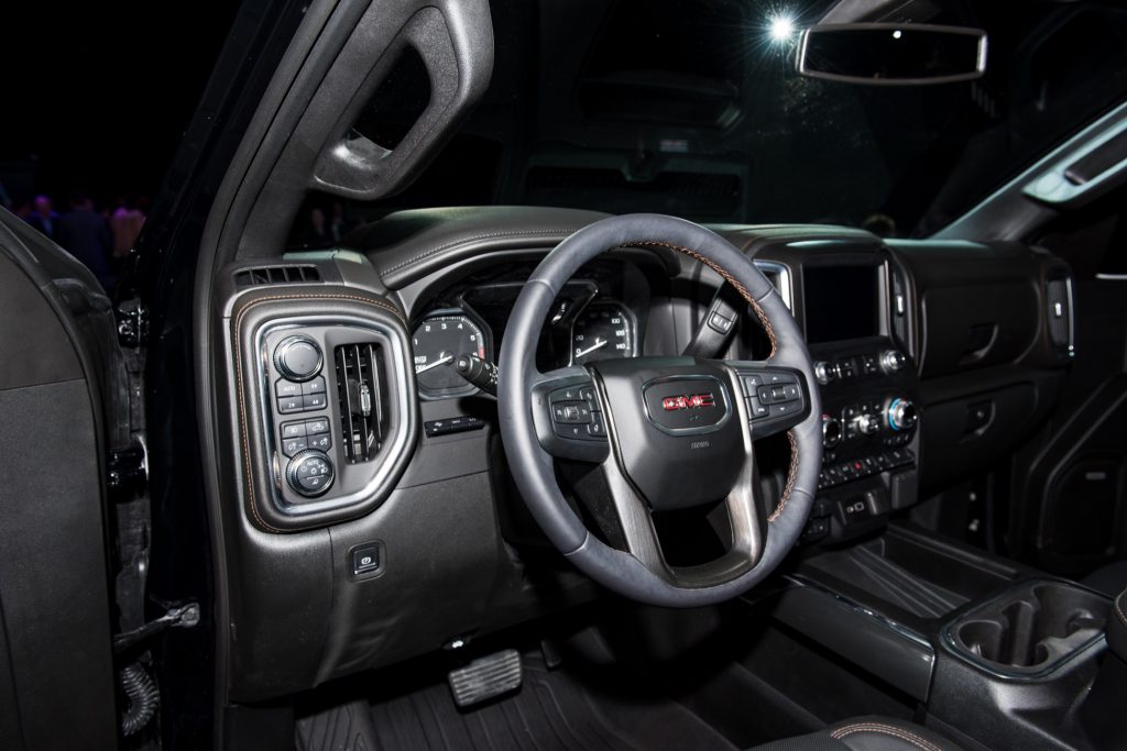 2019 GMC Sierra AT4 1500 interior live at 2018 New York Auto Show 002 cockpit and steering wheel