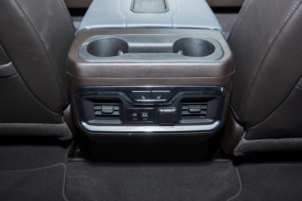 2019 GMC Sierra Denali 1500 interior - 2018 New York Auto Show Live 021 - rear AC vents and seat heat controls and USB ports